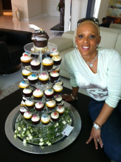 MonicaWithCupcakeTower.JPG